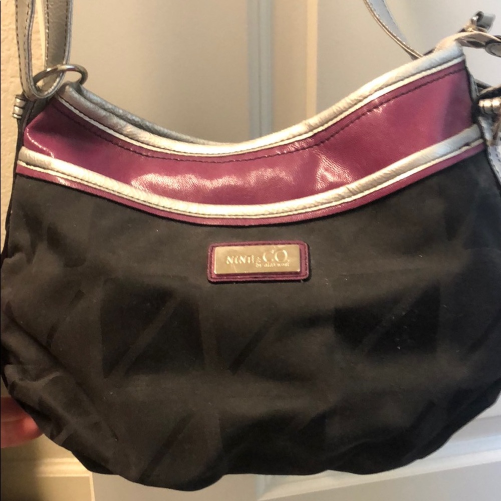 Pink, black and silver Nine and Co purse